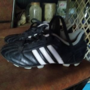 Adidas leather cleats.
